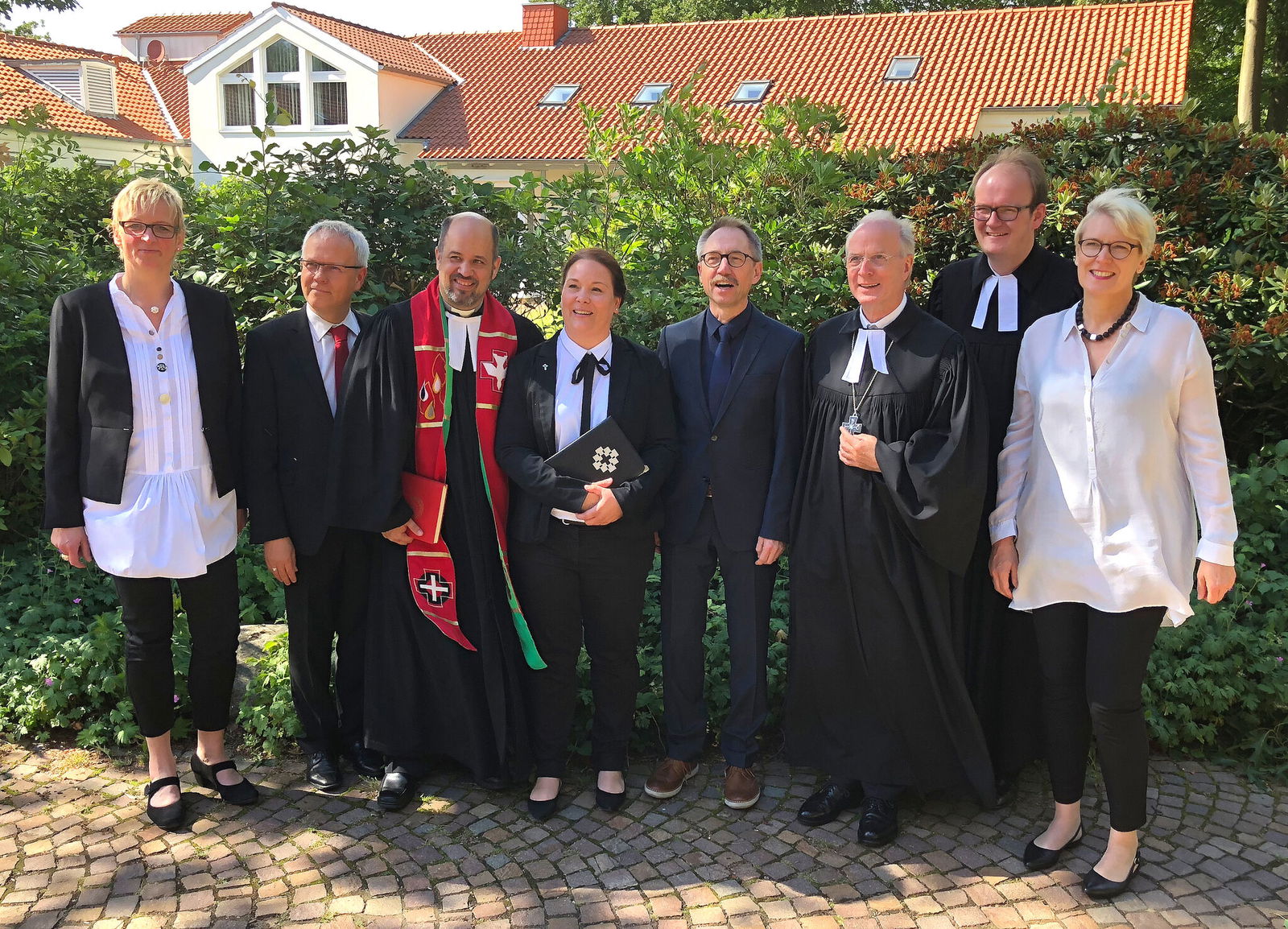 Dr. Klahr mit Dozenten in Loccum 